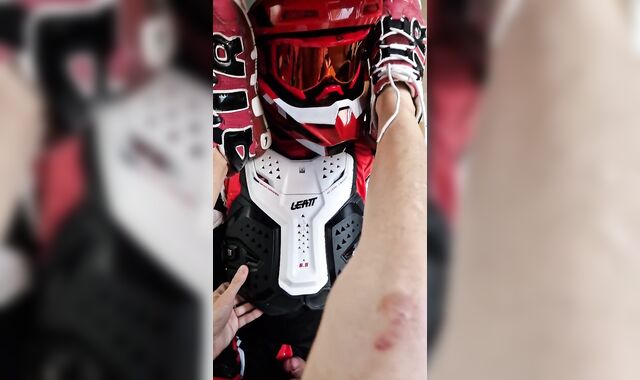 Stud humps another boy in a motocross apparel