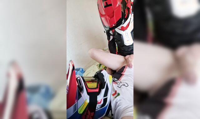 Stud humps another boy in a motocross apparel