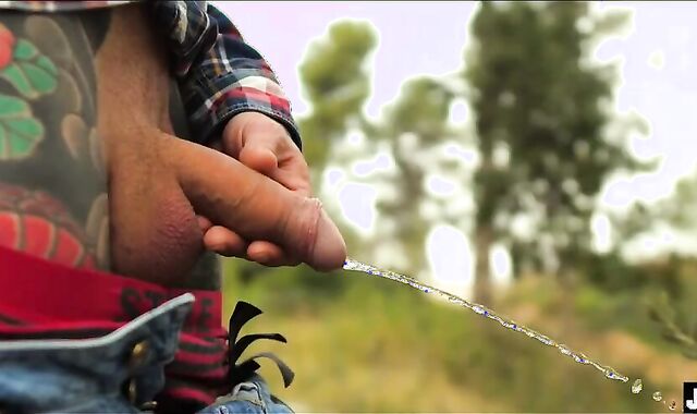 two MOUNTAINEERS MASTURBATE OFF IN THE FOREST