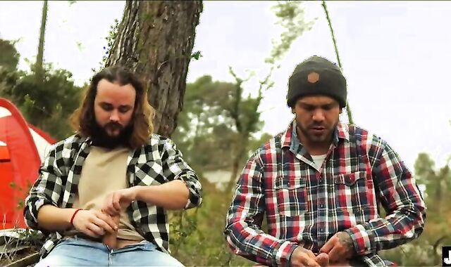 two MOUNTAINEERS MASTURBATE OFF IN THE FOREST