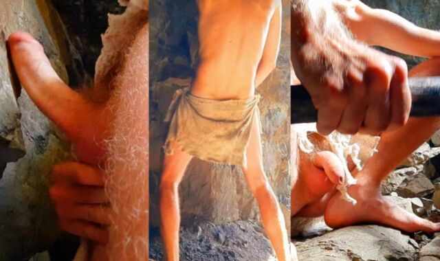 Neanderthal stud jacks hard-on in a tunnel near a campfire