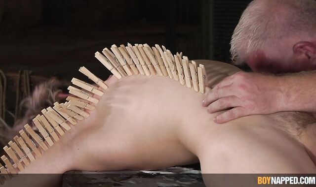 Joey Valentine toys with clothespins by Sebastian Kane