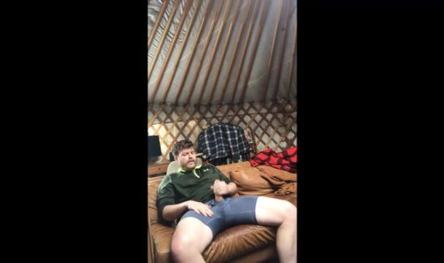 Crazy fellow alone in the wilderness chops weenie and rockets his cum by the fire