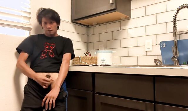 Wanking in the kitchen