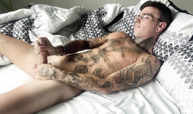 Torrid inked stud shots own jizm into throat