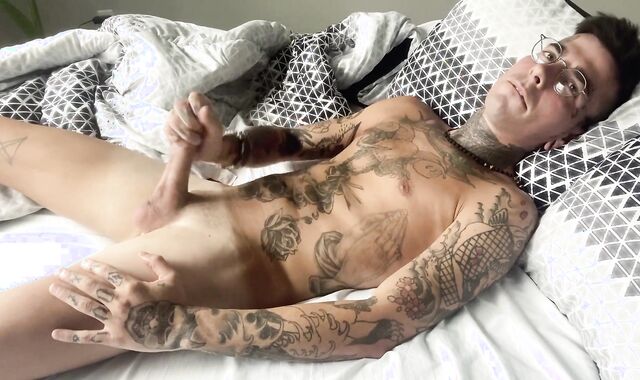 Torrid inked stud shots own jizm into throat