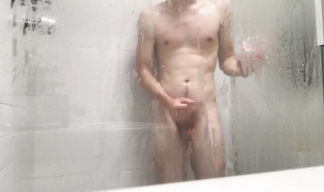 Strung Up Twunk Gets Soaped Up and has thick Pop-Shot on the Bathroom Glass Door