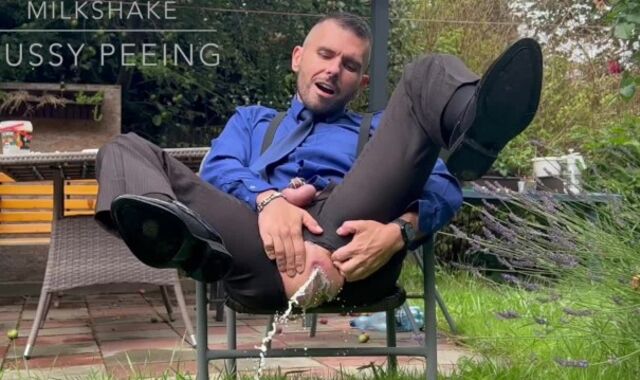 Suited stud is toying with his mancunt in public