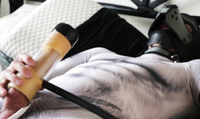 Pup clad in petsuit shoots a fountain enormous using Venus 2000 milker