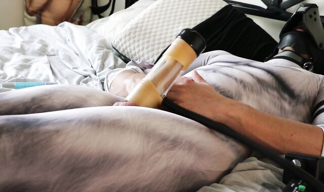 Pup clad in petsuit shoots a fountain enormous using Venus 2000 milker