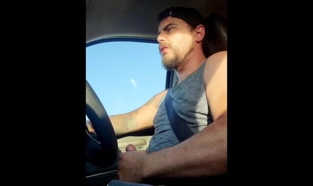Country guy wanks off while driving
