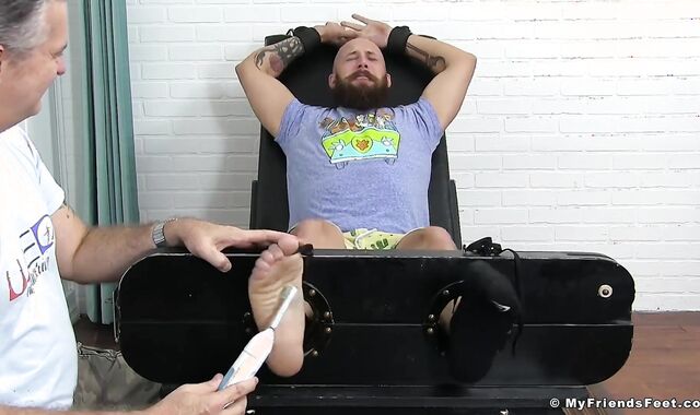 Bearded faggot is a passionate feet tickle away from his limit
