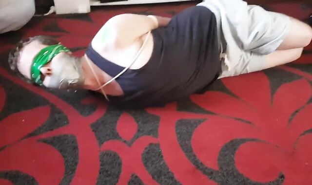 TRUSSED LIKE A HOG AND TAPE BALL-BALL-GAGGED