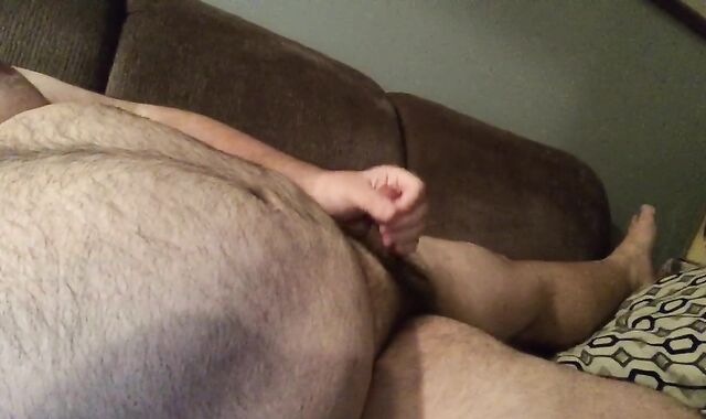 Front couch jack to some gay-for-pay pornography