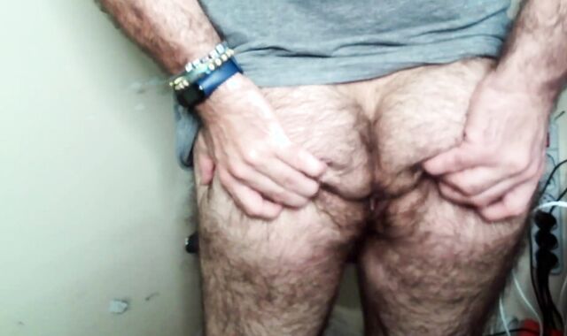 I HAVE JOY WITH A LITTLE DRILL STICK WHILE I CUM ON MY HAIRY CHEST