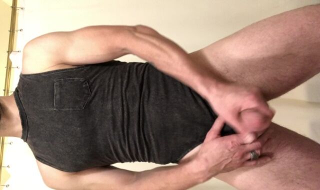 Michael Mission clothed in a sub garb, unclips goods and plays with his beef whistle