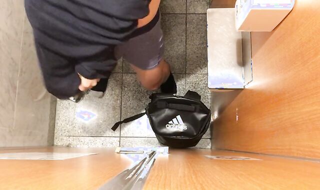 Stroking off in a shopping mall rest room