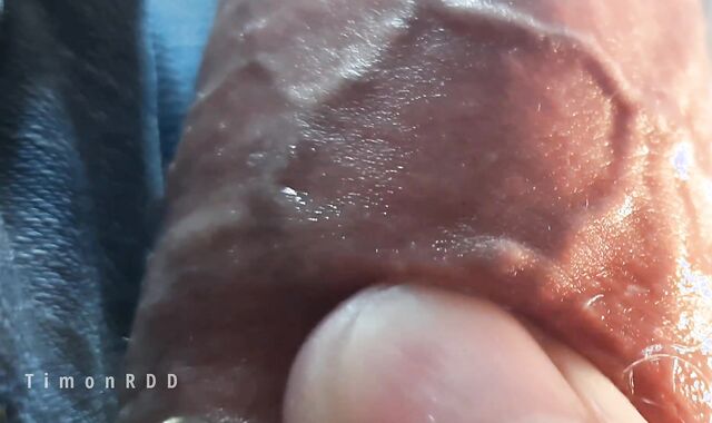 The guy jism abundantly putting his thumbs under the foreskin