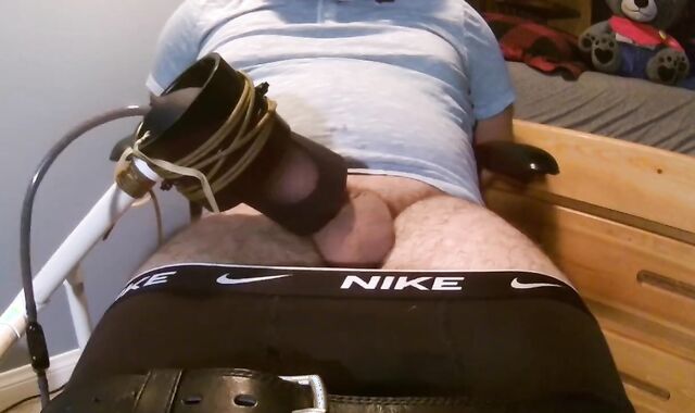 Strapped Sub Struggling Against Wanking Machine