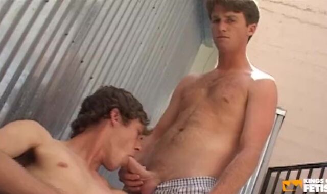 Dark Haired twunk deep mouths a pal and jacks his ample trouser snake until he blows a geyser