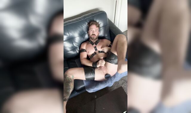 Leather Boy Maintains Total Eye Contact While Playing with Ass Rump-Butt-Plug