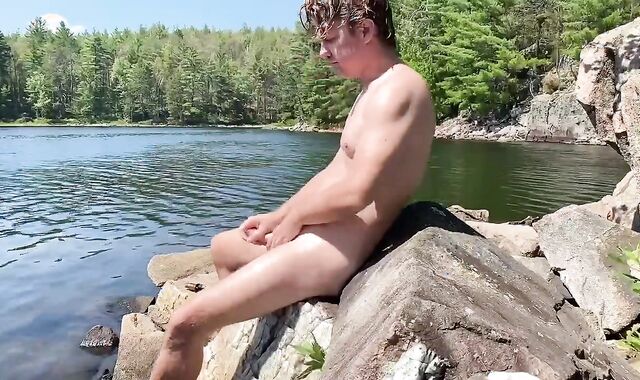 Canadian dude wanks off on the rocky shoreline of a individual lake. ????????????????
