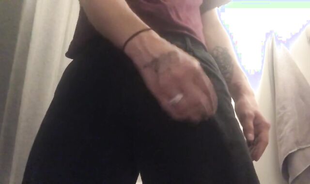 The boy is playing with his meatpipe