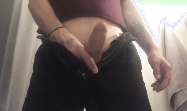 The boy is playing with his meatpipe