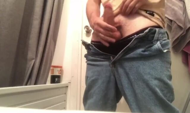 A dude in jeans milked off his man sausage and nutted