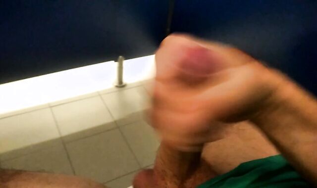 Pig Fellow Spunks in the Public Wc while Stagging on a Stranger Pissing Next Door