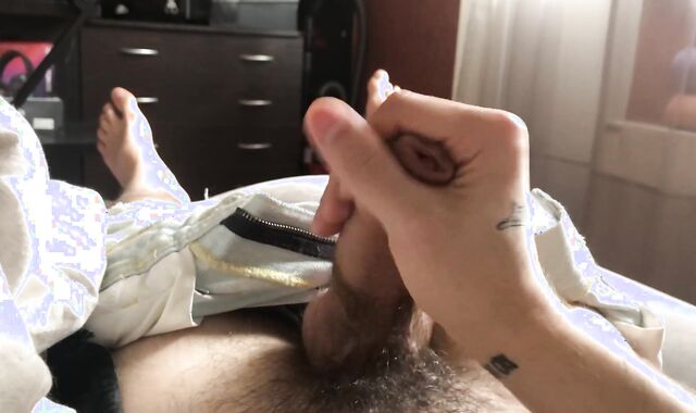 A young dude stroked off a morning pink cigar and jizm abundantly on his abdomen