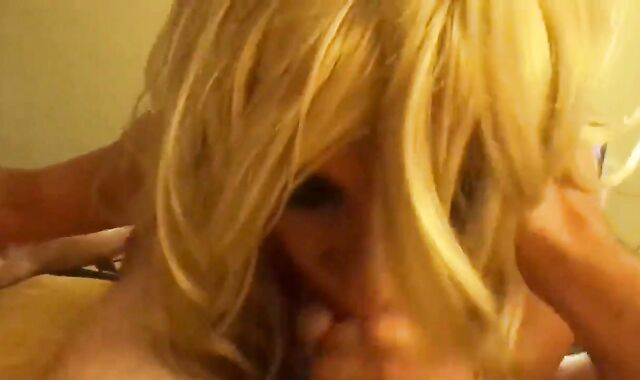 Trashy blonde crossdresser sucks two cocks