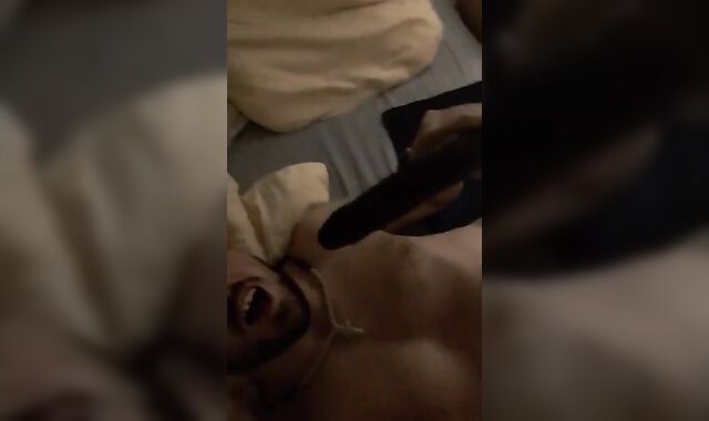 Serbian Boy plays with his black dildo!