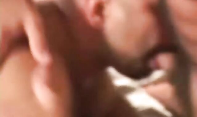 two Daddy-Cubs boink their lad