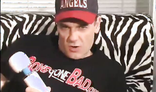 Father lays on the floor and uses a fake-meatpipe