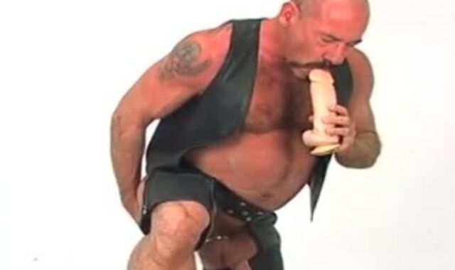 Butch leather dressed in elderly chap w/ fat faux dick