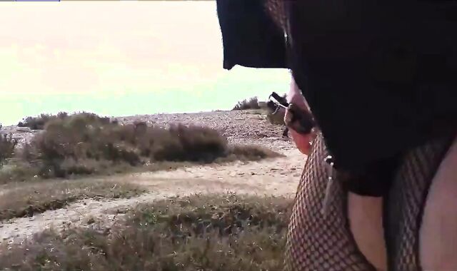 Public Crossdressing and wanking on the beach