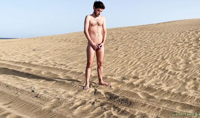 Pissing on the gay nude beach