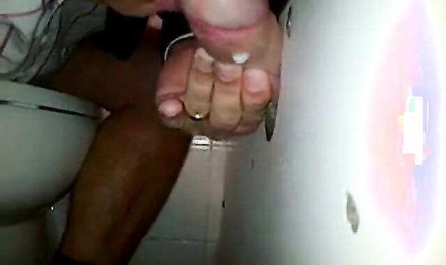 Glory hole cock sucking with cum swallow..
