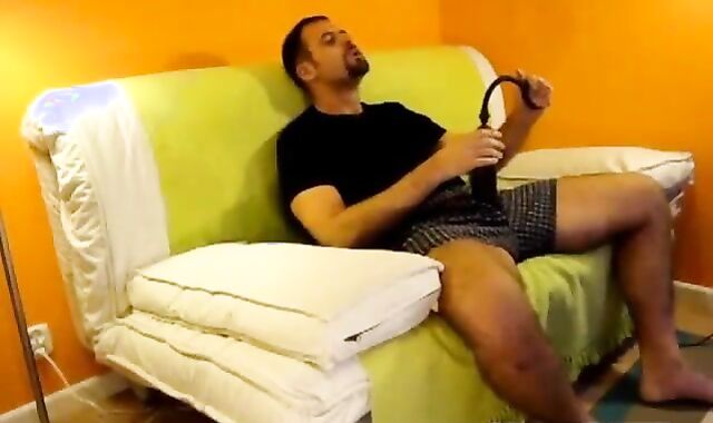 Big-Cock Daddy Strokes Alone in Orange Room