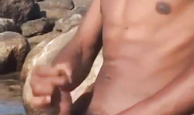Arab Twink Strokes His Big Dick Outdoors by the Beach