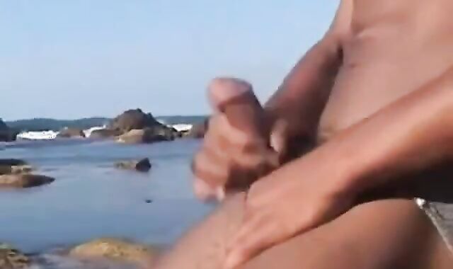 Arab Twink Strokes His Big Dick Outdoors by the Beach