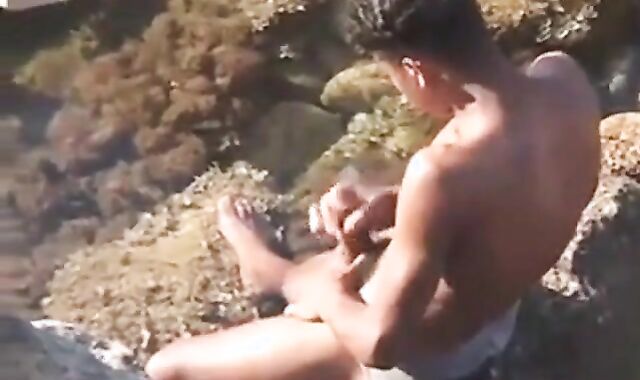 Arab Twink Strokes His Big Dick Outdoors by the Beach