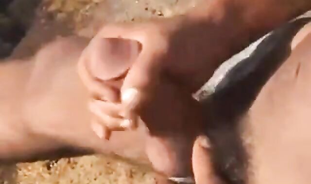 Arab Twink Strokes His Big Dick Outdoors by the Beach