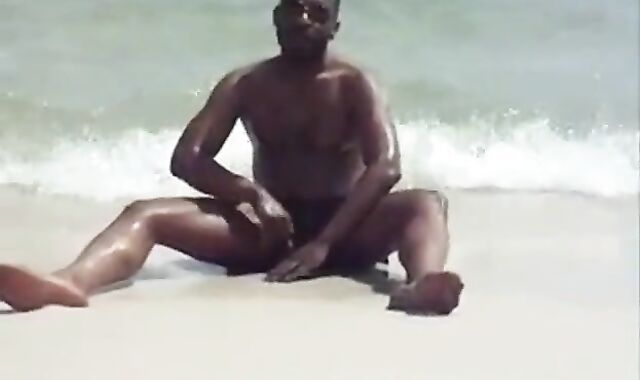 Black Amateur Strokes His Big Cock Outdoors at the Beach