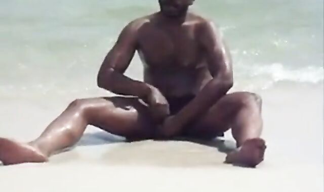 Black Amateur Strokes His Big Cock Outdoors at the Beach