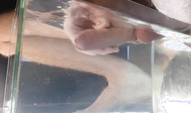 Russian boy powerfully jizzes cum into water