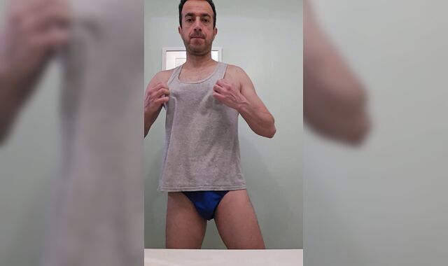 Stud doing unwrap tease2