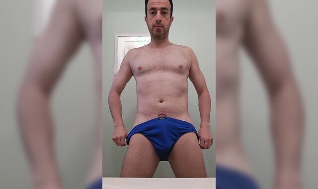 Stud doing unwrap tease2