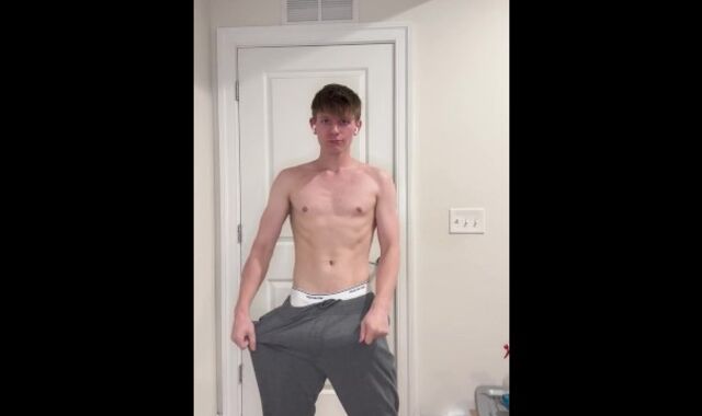 Draped Youngster Unsheathes Humungous Man-meat Under Gray Sweatpants